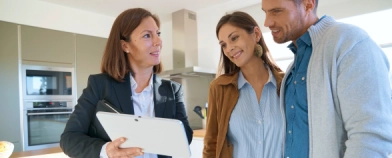 realtor with clients (real estate industry)