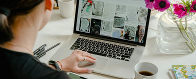 laptop with a social media network on the screen