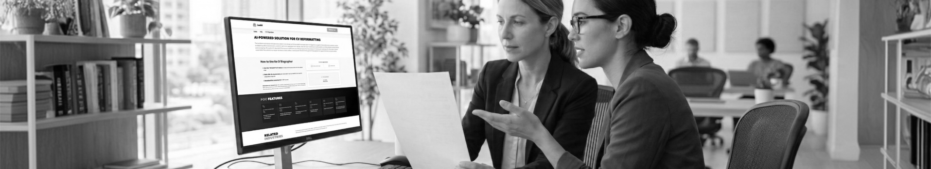 Women at a PC with AI-powered CV converter on the screen